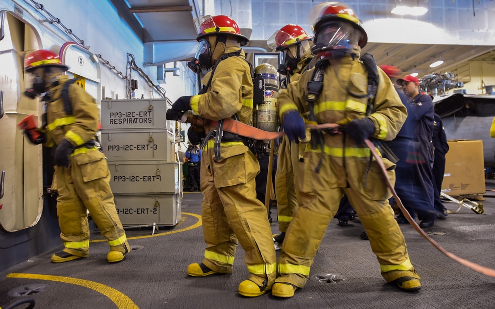 USS Ronald Reagan (CVN 76) Sailors conducts flying squad drill