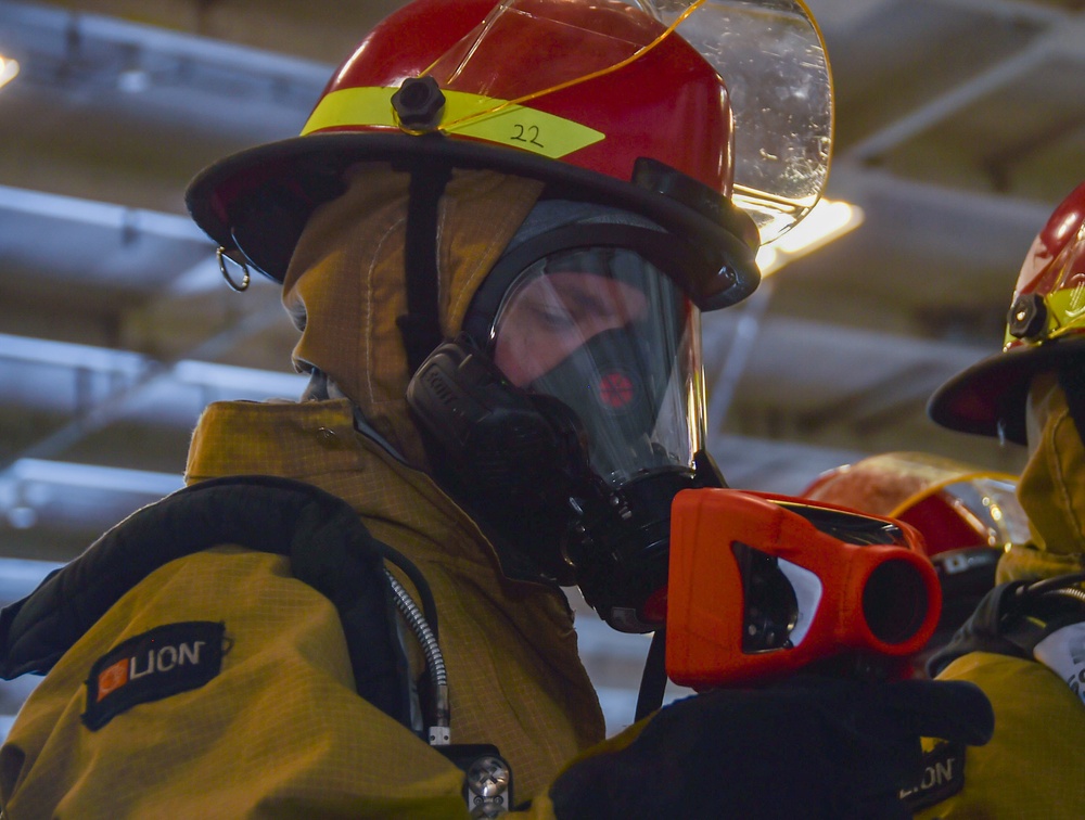 USS Ronald Reagan (CVN 76) Sailors conducts flying squad drill