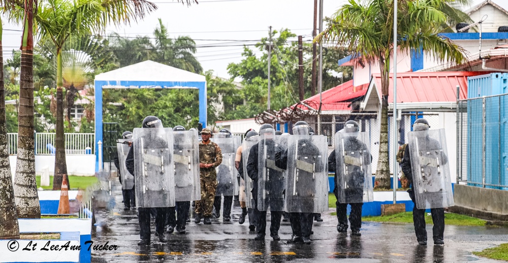 Royal Bermuda Regiment instructors train the Guyana Police Service on Public Order Riot Training during TRADEWINDS 23
