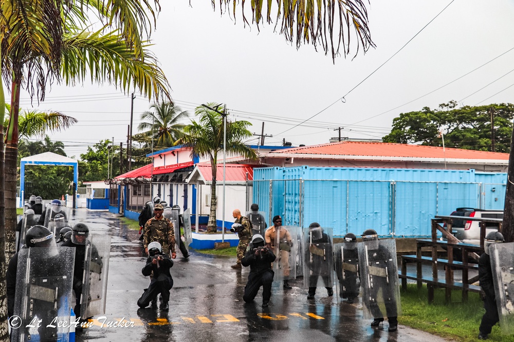 Royal Bermuda Regiment instructors train the Guyana Police Service on Public Order Riot Training during TRADEWINDS 23