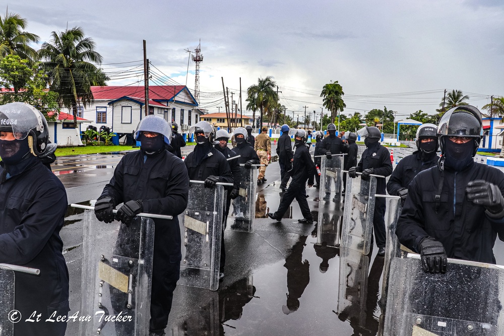 Royal Bermuda Regiment instructors train the Guyana Police Service on Public Order Riot Training during TRADEWINDS 23