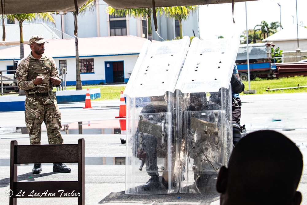 Royal Bermuda Regiment instructors train the Guyana Police Service on Public Order Riot Training during TRADEWINDS 23