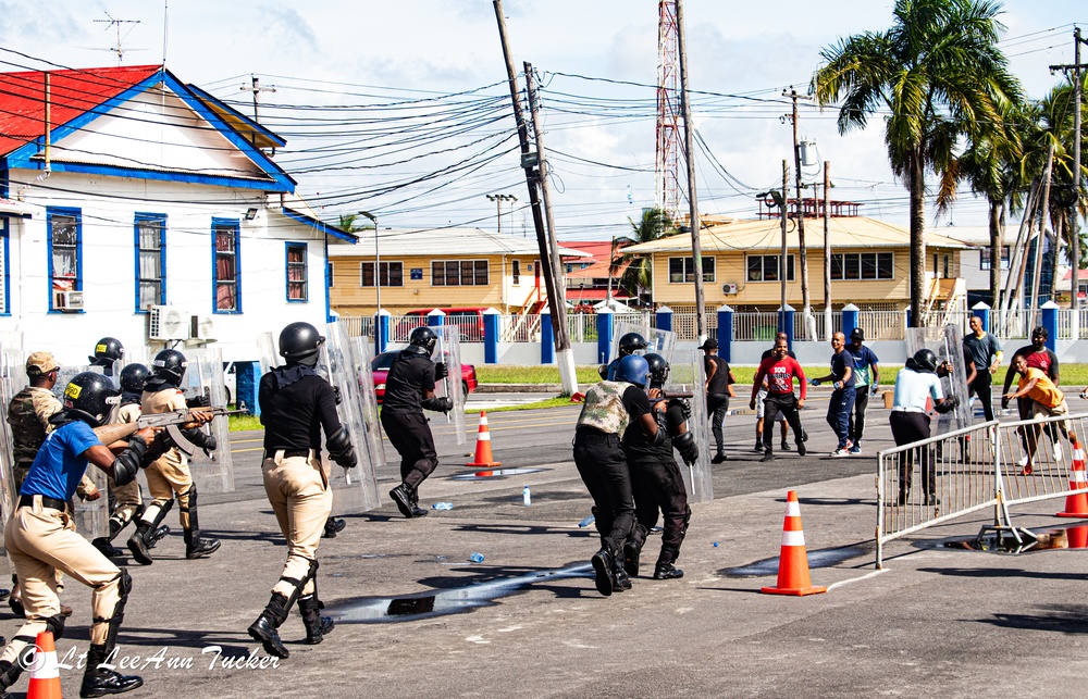 Royal Bermuda Regiment instructors train the Guyana Police Service on Public Order Riot Training during TRADEWINDS 23
