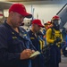 USS Ronald Reagan (CVN 76) Sailors conducts flying squad drill