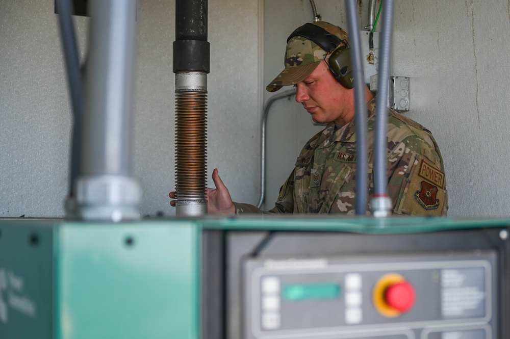 Air Force engineers trek Montana mountain to service radio communications generator