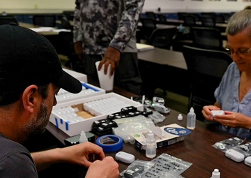 Joint service CBRN exercise a perfect opportunity for USAMMDA’s wearable health monitor team