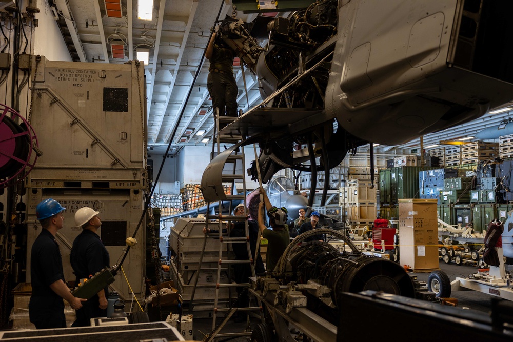 USS Bataan Sailors and 26th MEU Marines perform maintenance