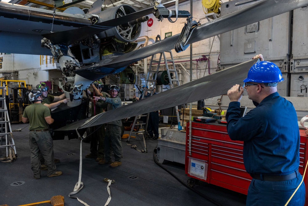 USS Bataan Sailors and 26th MEU Marines perform maintenance