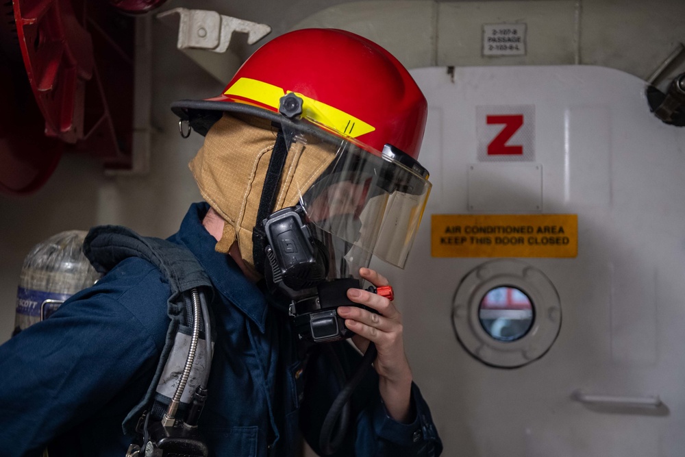USS Ronald Reagan (CVN 76) Sailors conduct flying squad drills