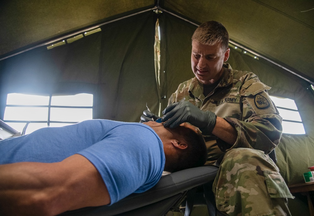 Soldiers of the 144th Area Support Company, Utah National Guard, provide real-world medical support during Talisman Sabre