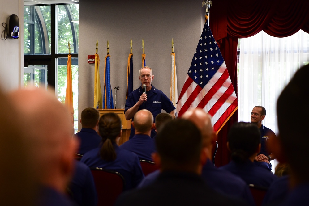 Coast Guard Atlantic Area commander presents Coast Guard First District the Meritorious Unit award