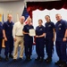 Coast Guard Atlantic Area commander presents Coast Guard First District the Meritorious Unit award