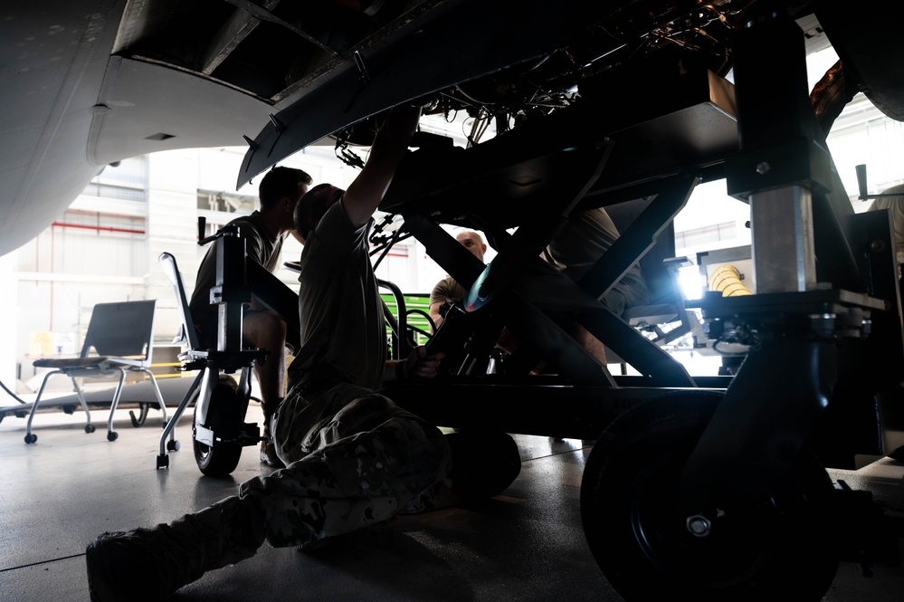 Airmen at work: 911th aerospace propulsion technicians swap APU