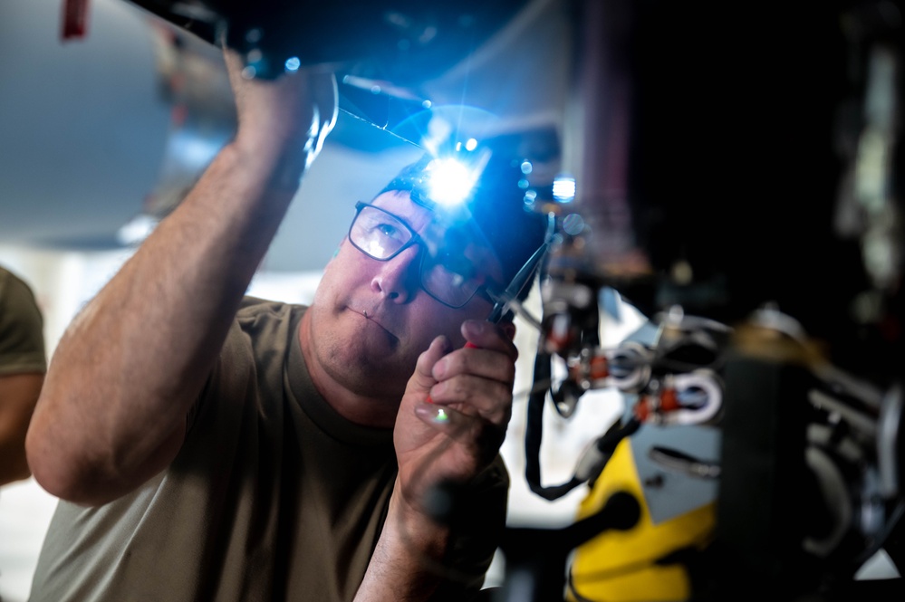 Airmen at work: 911th aerospace propulsion technicians swap APU