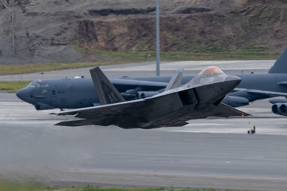 B-52s and 5th-Gen Fighters conduct training sorties above Alaska