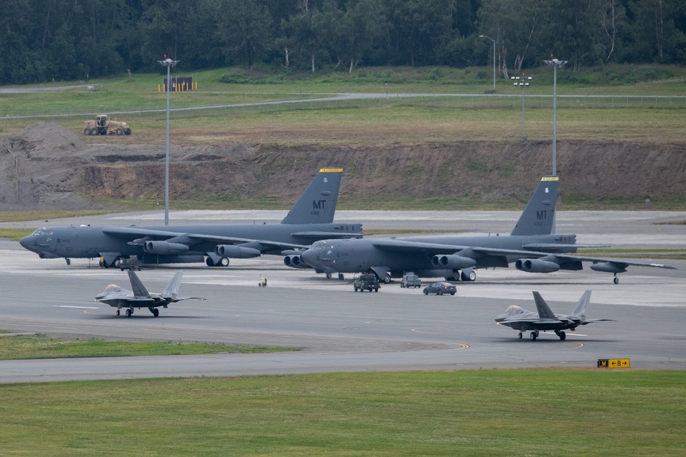 B-52s and 5th-Gen Fighters conduct training sorties above Alaska