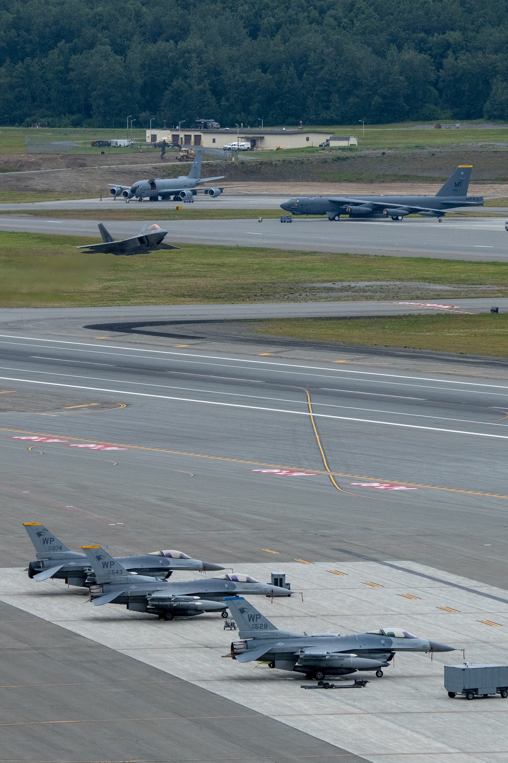 B-52s and 5th-Gen Fighters conduct training sorties above Alaska