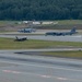 B-52s and 5th-Gen Fighters conduct training sorties above Alaska