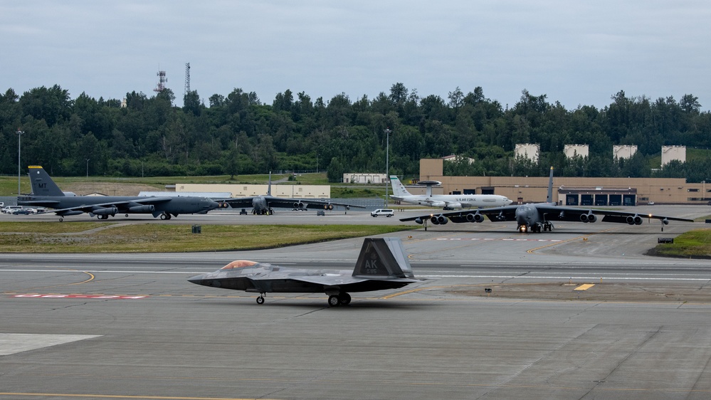 B-52s and 5th-Gen Fighters conduct training sorties above Alaska