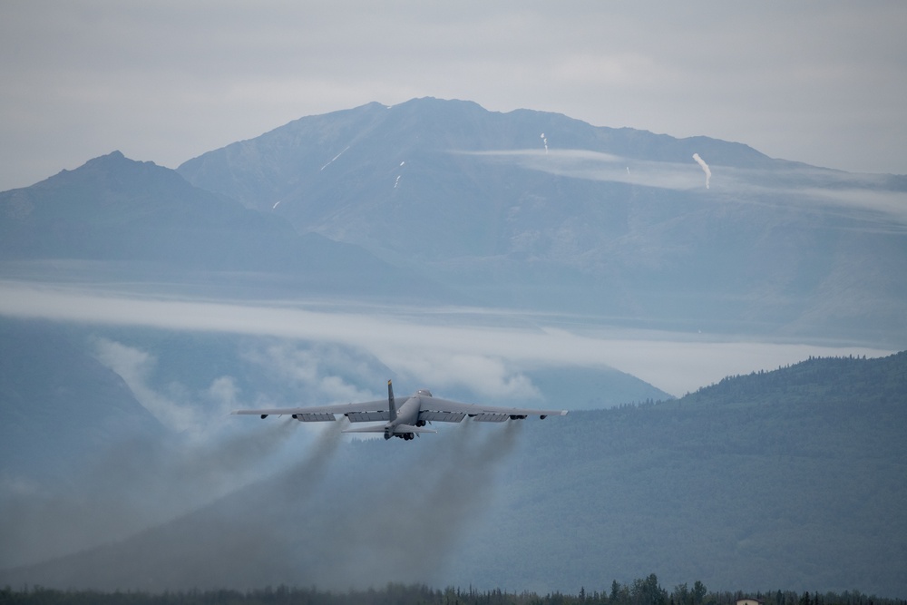 B-52s and 5th-Gen Fighters conduct training sorties above Alaska