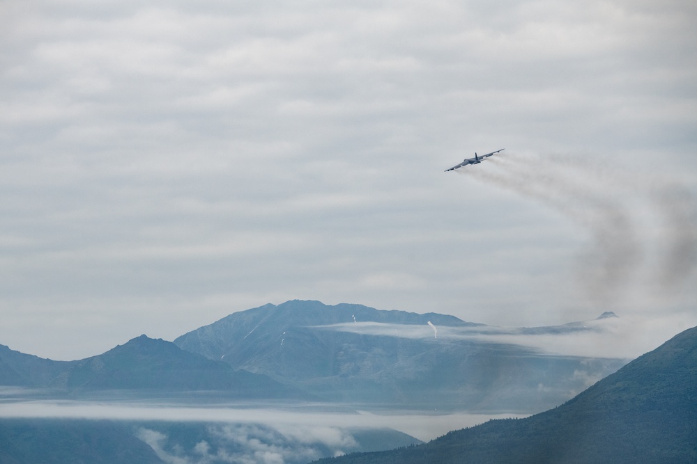 B-52s and 5th-Gen Fighters conduct training sorties above Alaska