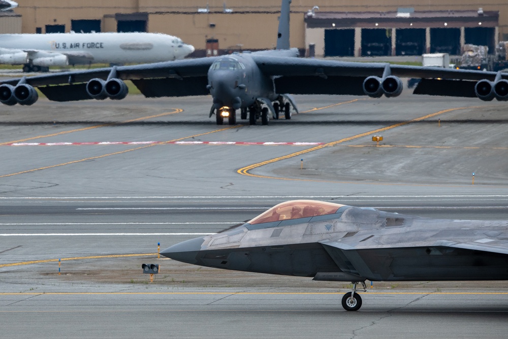 B-52s and 5th-Gen Fighters conduct training sorties above Alaska