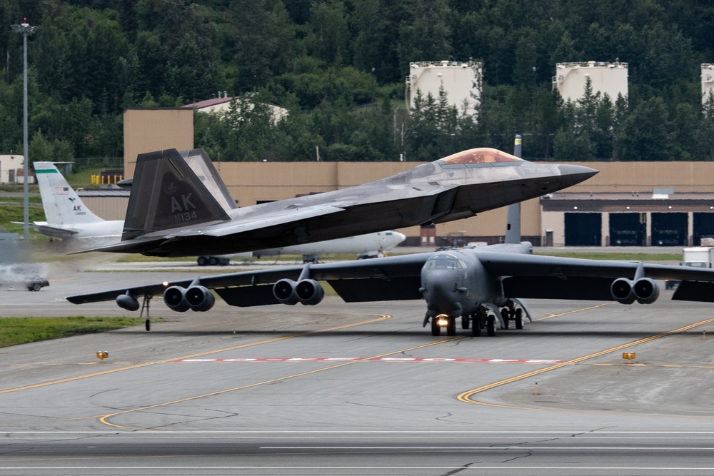 B-52s and 5th-Gen Fighters conduct training sorties above Alaska