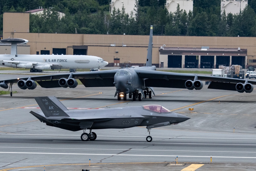 B-52s and 5th-Gen Fighters conduct training sorties above Alaska