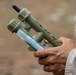 Simulated OPFOR Member Holds Explosive Device