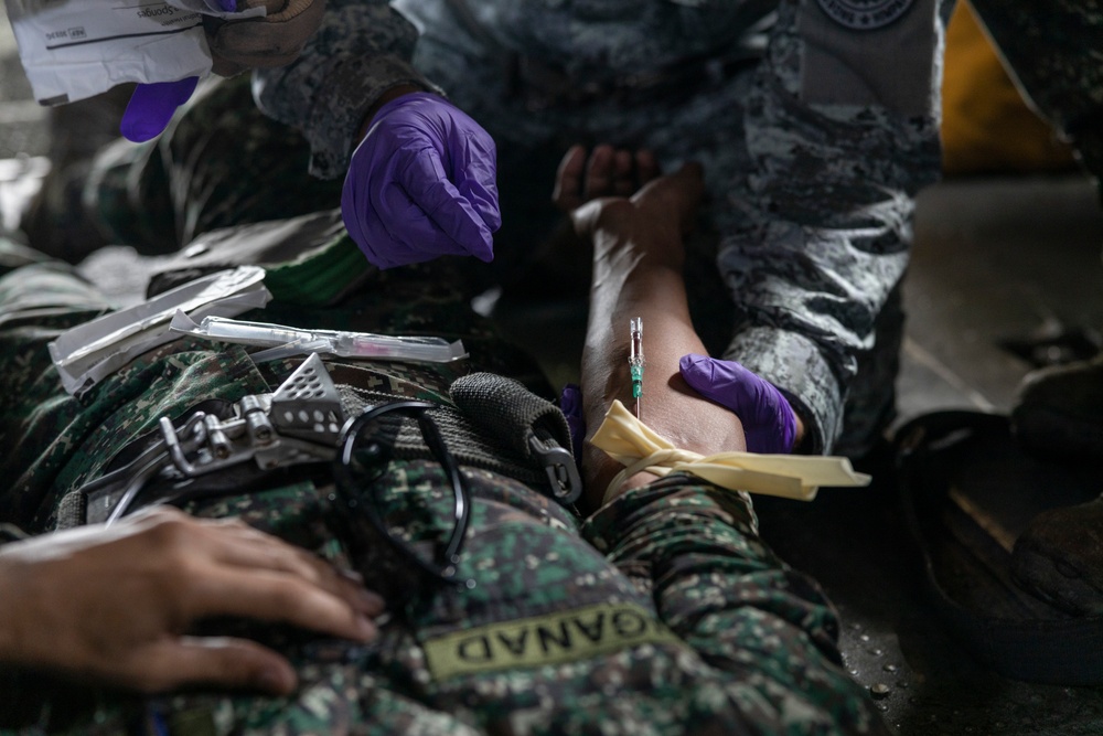 Medical Care in the Air | Philippine Marines, Airmen, and U.S. Navy Sailors practice CASEVAC drills