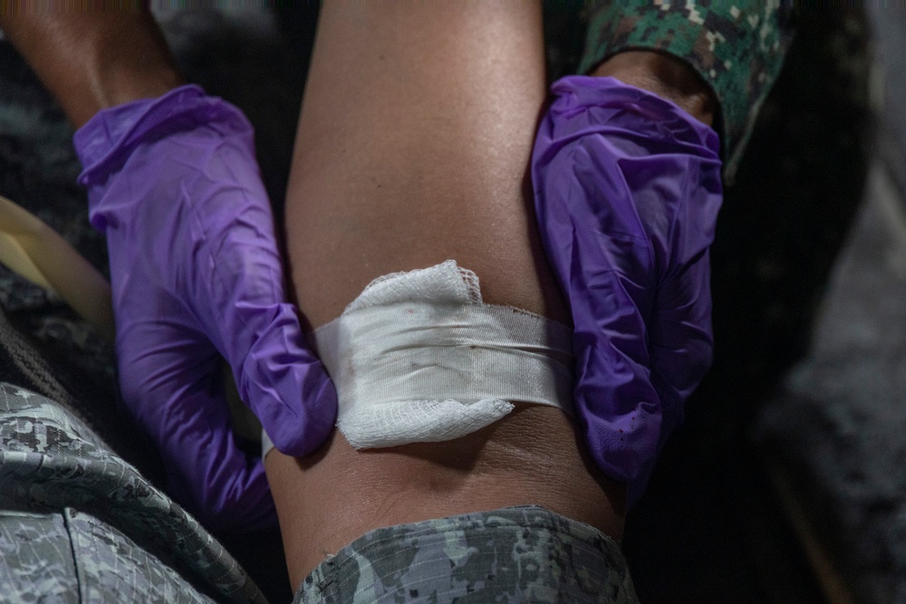 Medical Care in the Air | Philippine Marines, Airmen, and U.S. Navy Sailors practice CASEVAC drills