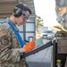 USAF Airmen and RAAF aviator refuel F-22 Raptors