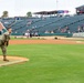 Outstanding Airman winner throws first pitch
