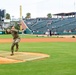 Outstanding Airman winner throws first pitch