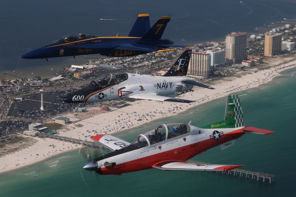 Training Air Wing 6 and Blue Angel Aircraft Fly in Formation