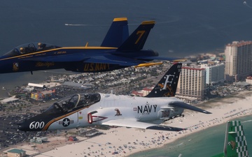 Training Air Wing 6 and Blue Angel Aircraft Fly in Formation