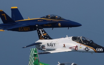 Training Air Wing 6 and Blue Angel aircraft fly in formation