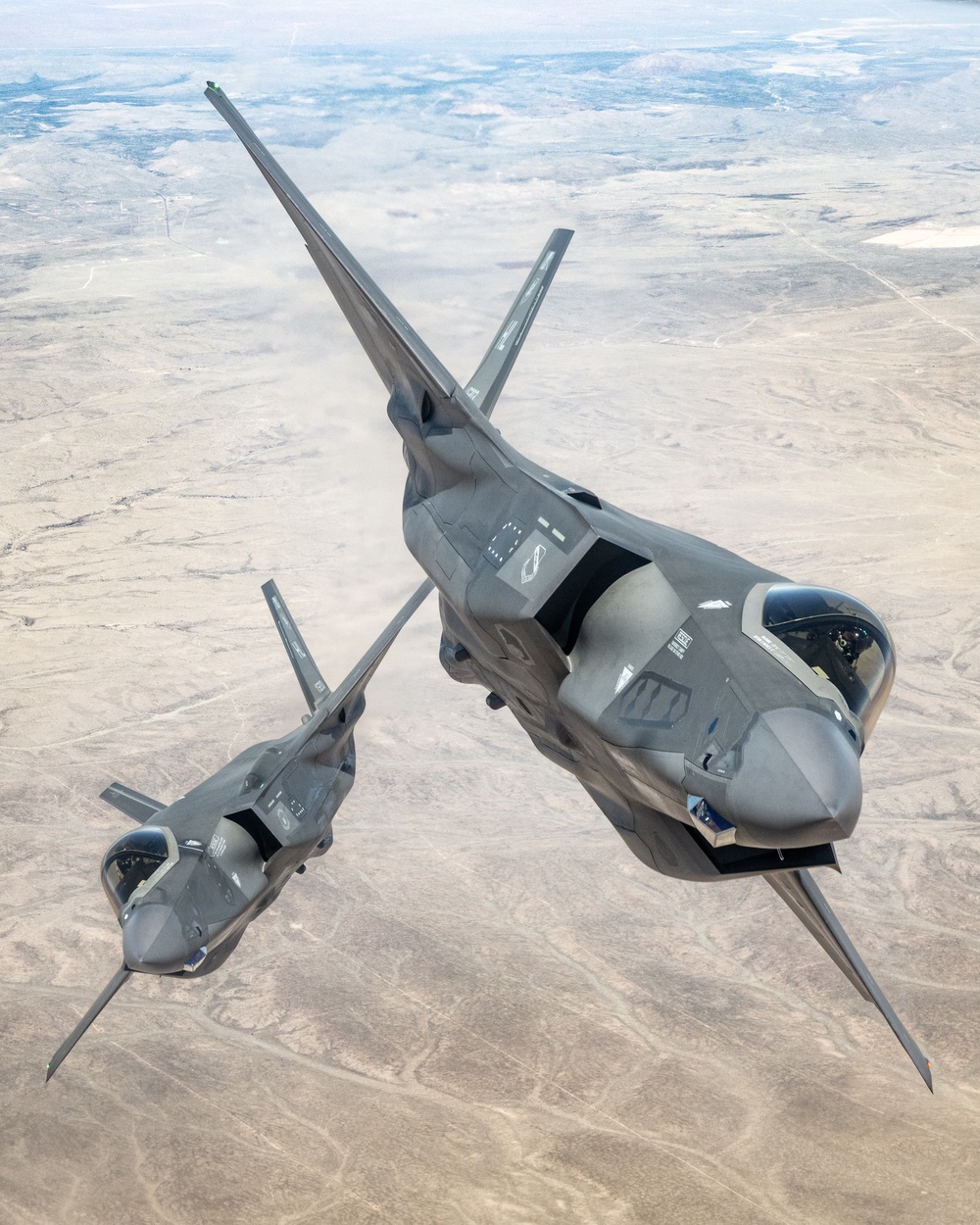 Two F-35As Fly in Formation Over the Arizona Desert