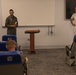 Commodore Readwin presents award to F35-B Pilot