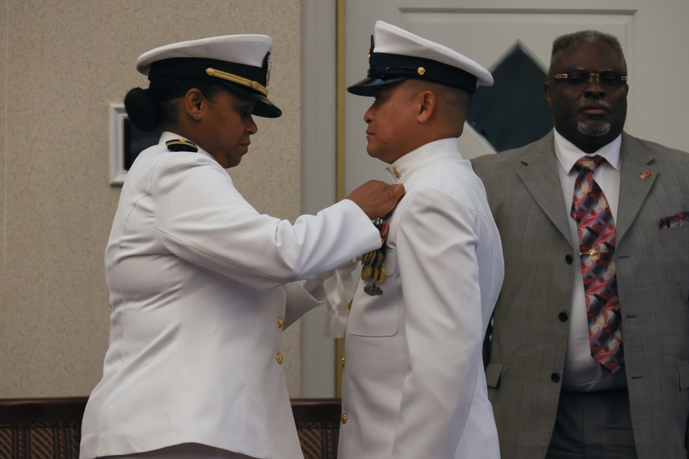 U.S. Navy Chief Wendell Tabios receives a Navy and Marine Corps Commendation Medal