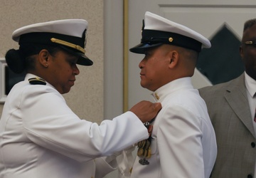U.S. Navy Chief Wendell Tabios receives a Navy and Marine Corps Commendation Medal