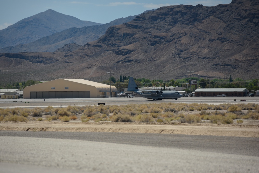 Marine C-130 at Creech; loading equipment and Airmen