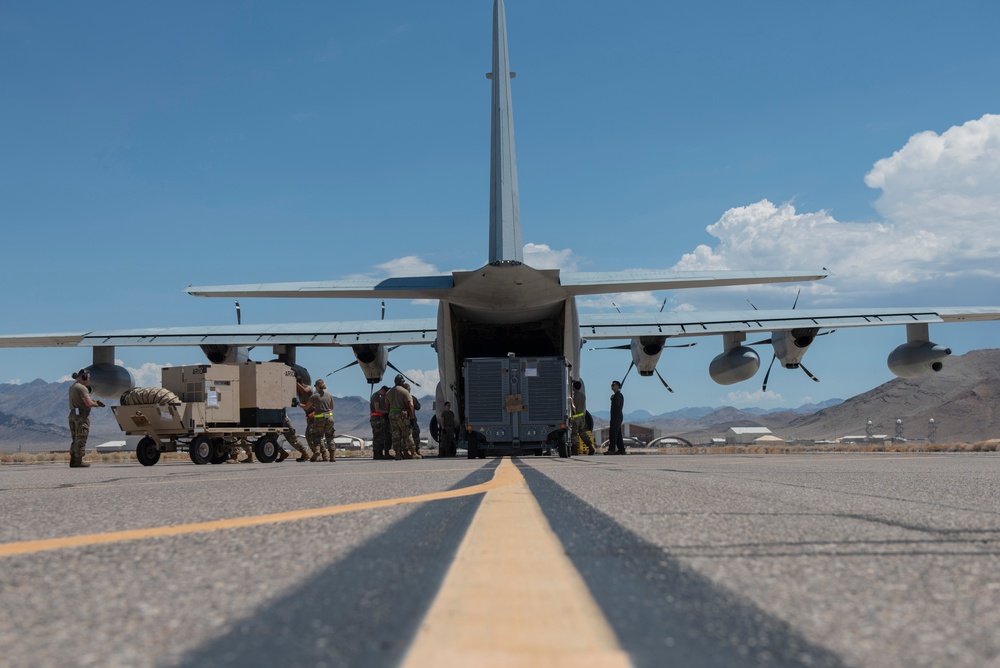 Marine C-130 at Creech; loading equipment and Airmen