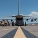 Marine C-130 at Creech; loading equipment and Airmen