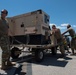 Marine C-130 at Creech; loading equipment and Airmen