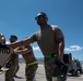 Marine C-130 at Creech; loading equipment and Airmen