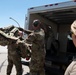 Marine C-130 at Creech; loading equipment and Airmen