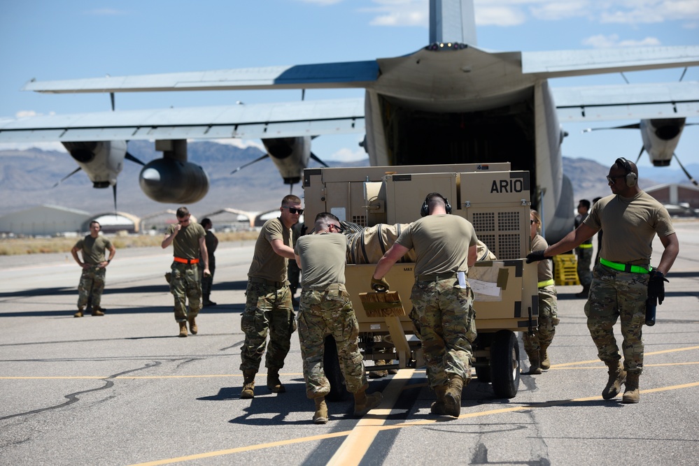Marine C-130 at Creech; loading equipment and Airmen