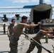 Marine C-130 at Creech; loading equipment and Airmen