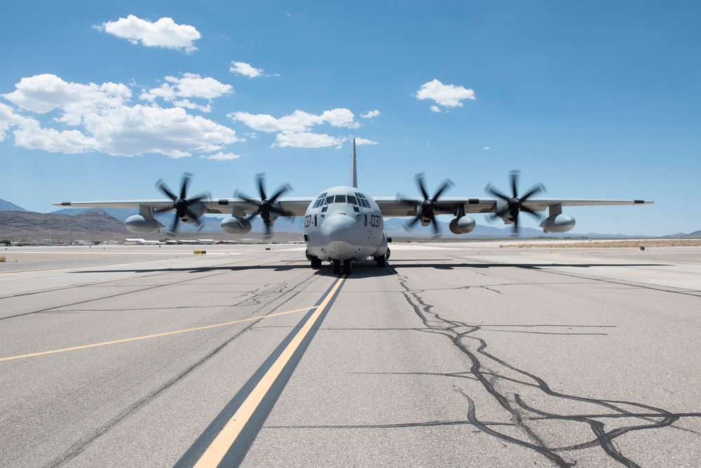 Marine C-130 at Creech; loading equipment and Airmen